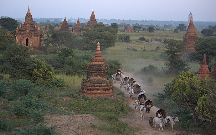 Group of photographers capturing stunning landscapes and cultural moments during the best Myanmar photo tour, showcasing the beauty and essence of the country."